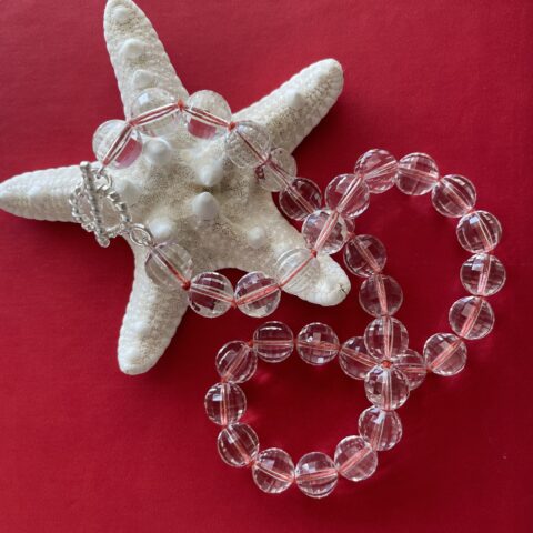 Faceted Crystal Quartz on orange silk