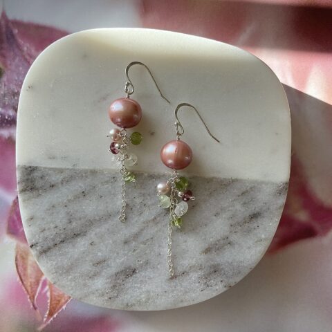 Pink tassels with peridot detail
